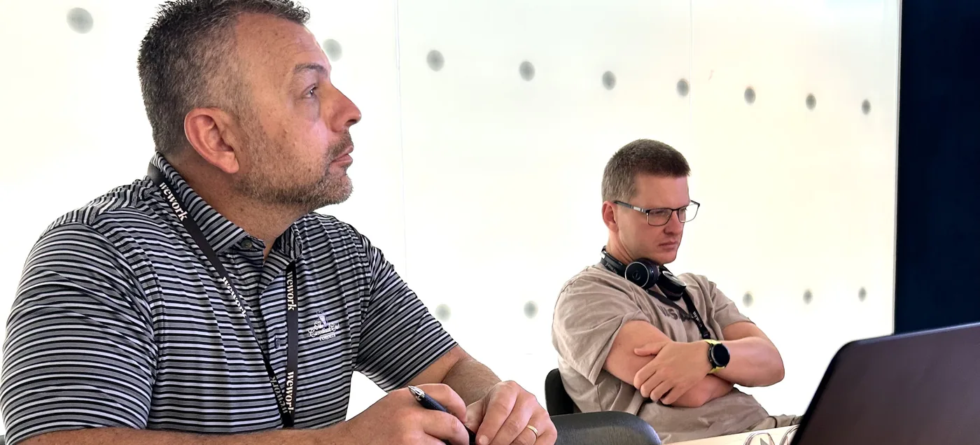 Two colleagues listening during a WealthArc working session